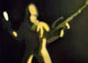 Blurred Army Man with Rifle